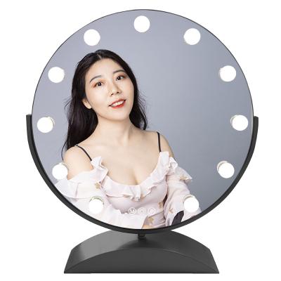 China 2022 NEW Touch Lighted Sensor Led Hollywood Makeup Mirror 11pcs Large Bulb Dimming Round Party Vanity Mirror Christmas Gift for sale