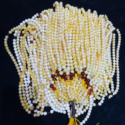 China DIY Jewelry Making 8-9+mm High Quality Gold Amber Beads Natural White Baltic Amber Beads Factory Price And Muslim Prayer Beads for sale