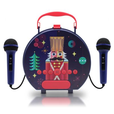 China Electronic Mini Portable Storaged Kids Karaoke Machine Electronic Handheld Speaker Rechargeable Karaoke Musical Set With 2 Mics for sale