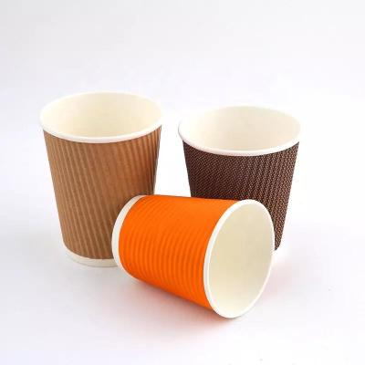 China Recyclable Custom Logo Stylish Design Ripple Double Wall Insulated Coffee Takeaway Hot Paper Cup With Lids for sale