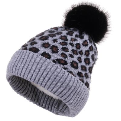 China Wholesale COMMON Ball Beanie Hat Leopard Print Knitted Pom Pom Hat Winter Women's Raccoon Fur Hat for sale