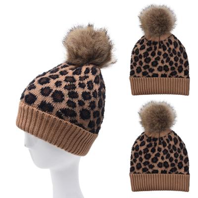 China Wholesale COMMON Women's Winter Gray Leopard Knitted Beanie Hats Warm Black White With Pom Pom for sale