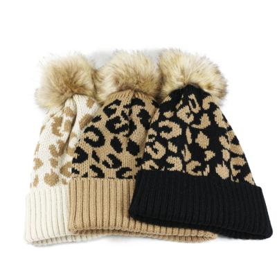 China 2021 New Product Design COMMON Leopard Print Knitted Hats Pom Pom Leopard Printed Knitted Beanies Hats for sale