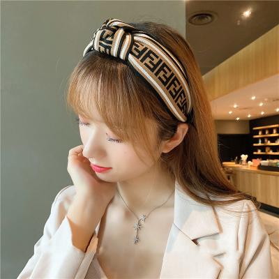 China Famous Fashion Design Vintage Headband Wide-sided Cross Headband Hair Accessories With F Letters for sale