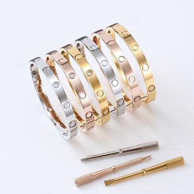 China Designer Jewelry Fashion 316L Stainless Steel Christmas Screwdriver Bangle Love Couples Screw Brand Luxury Bangle For Women for sale