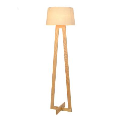 China Simple And Unique Modern Warm Design Tripod Wooden Floor Standing Lamps For Hotel for sale