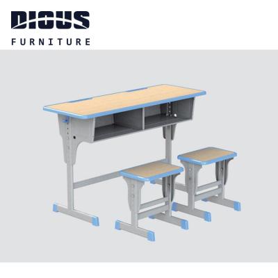 China New Diousnew Modern Commercial Adjustable Student Study Double Desk School Furniture and Stool Set for sale