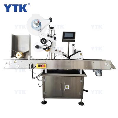 China YTK-330 automatic food sticker labeling machine for medical cosmetic glass bottle for sale