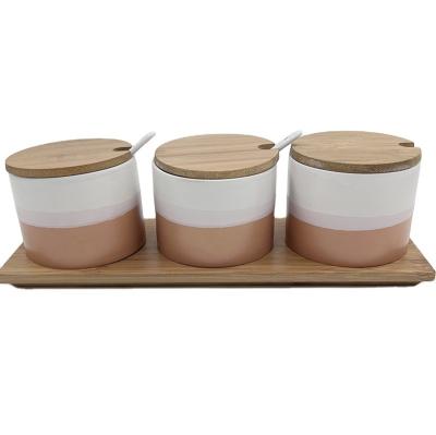 China Kitchen Decor Tea Sugar Coffee Kitchen Storage Ceramic Jar Canisters Stored Container Sets For Spice Jar With Bamboo Dish for sale