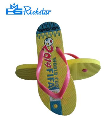 China Hot flat grain effect strap football world cup promotion slippers pressed unique flip flops for men for sale