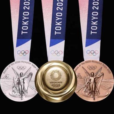 China Custom Cheap Metal Collector Sport Soccer Medals Tokyo Medals Collection Soccer Medals With Ribbon for sale