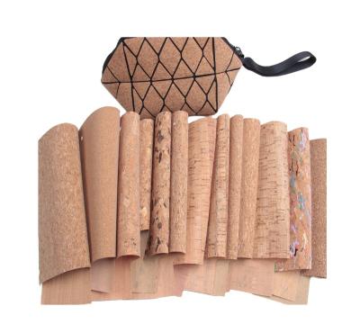 China Anti-rust Real Portugal Cork Material Granule Cork Synthetic Leather Natural Fabric For Bags Packaging Coasters Mats for sale