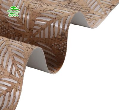 China Eco-friendly Anti-rust Botanical Leaf Laser Hollow Cork Fabric Synthetic Leather For Pillow Bags Wallpaper Cases for sale