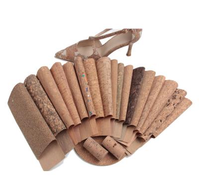 China Rustproof Ready To Ship Portugal Cork Material Leather Natural Stones In Carbide Vapor Cork Fabric For Shoe Covers for sale