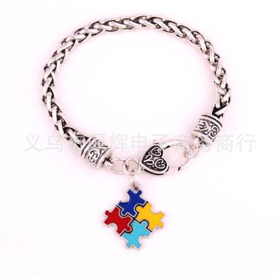 China Fashion Autism Awareness Bracelet Puzzle Piece Charm Bracelet Bangle Environmental Friendly Jewelry for sale