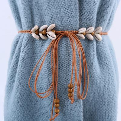 China Trendy Women's Fashion Waist Chain Dress Rope Sea Shell Small Narrow Wood Bead Belt Dress Tassel Belt Belts for sale