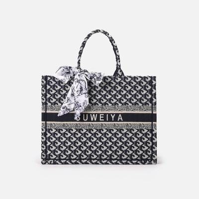 China New 2023 spring jacquard fabric anti-theft knitted tote bag Europe and the United States fashion female shoulder bag handbag bag for sale