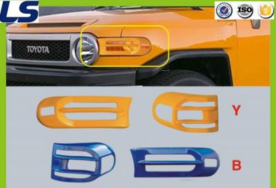 China ABS Plastic LED Headlamp Cover Auto Accessories for Toyota Fj Cruiser Light Shade for sale