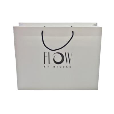 China OEM Styles Folding Paper Bag Custom Printing Apparel Packaging Bag White Paper Shopping Gift Bag for sale