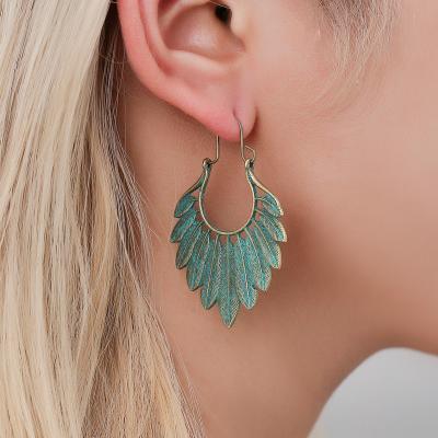 China TRENDY Earrings Boho Tribal Rustic Jewelry Aqua Feather Statement Earrings Metal Leaf Circle Bronze and Turquoise for sale