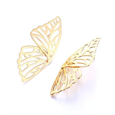 China CLASSIC fashion symmetrical butterfly wings simple hollow style texture circle earrings INS earrings for sale