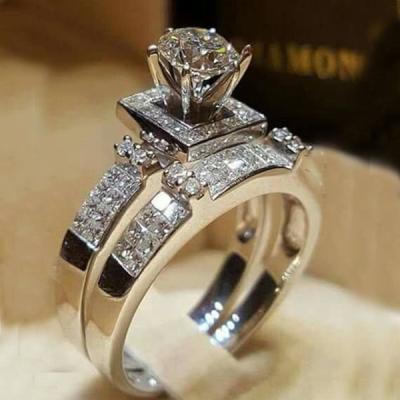 China Fashion Lead Free Nickel Free Cubic Zirconia Round Women's Ring Luxury Alloy Engagement Ring Geometric Couples Jewelry for sale