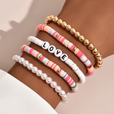 China 2021 Wholesales Vintage CLASSIC Bohemian Style Colorful 5 Piece Set Bracelet Clay Fashion Pearl Bracelet For Girls for sale