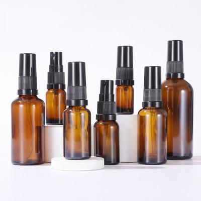 China 5ml-100ML Round Shoulder Essential Oil Amber Brown Wholesale Cosmetic Spray Bottle Chemical Packing Glass Bottle for sale