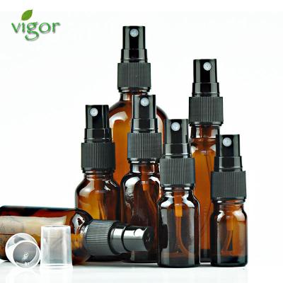 China Minimalist Style 100ml Glass Spray Bottle 50ml Round Amber Glass Spray Bottle With Pump Spray for sale