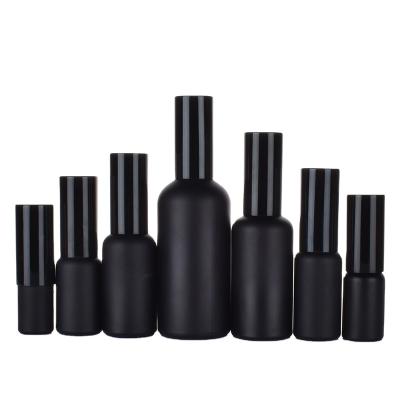 China Personal Care refillable 15ml 30ml 1oz 2oz 50ml 60ml matte black glass fine mist spray bottle with spray pump cap for hair spray for sale