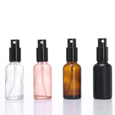 China Personal Care Refillable Matte Black Pink 15ml 30ml 1oz 2oz 50ml 100ml Spray Glass Bottle With Spray Pump Cap For Skin Care Packaging for sale