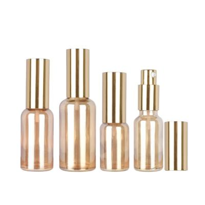 China Personal Care Glass Spray Bottle Gold Lid Lotion Pump Bottle Empty Containers Frost Cosmetic Packaging Glass Vial 5ML-100ML for sale