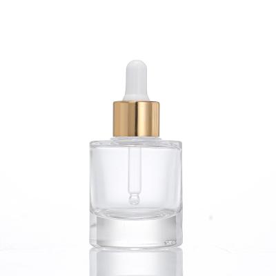 China 30ml Skin Care Cosmetic Wholesale Cosmetic Packaging Essential Oil Dropper Glass Bottle With Gold Dropper for sale