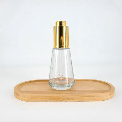 China New Design Cosmetic Push Button Shoulder 30ml Flat Essential Oil Bottle Frosted Glass Bottle Cosmetic Dropper for sale