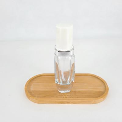 China Wholesale Bulk Clear Empty Essence Cosmetic Lotion Bottle Base Cosmetic Glass Bottle for sale