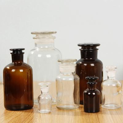 China Wild-mouth Chemical Wholesale Empty Amber Chemical Resistant Packaging Glass Bottles 500ml Reagent Bottle for sale