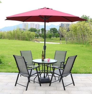 China Tabla y sillas de los muebles del jardín del verano fijadas con la sombra de Sun del parasol en venta