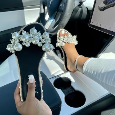 China Women bling pearl sandals slides summer 2021 trend fashion ladies rhinestone luxury flat jelly beach woman slippers pearl flat sandals for sale