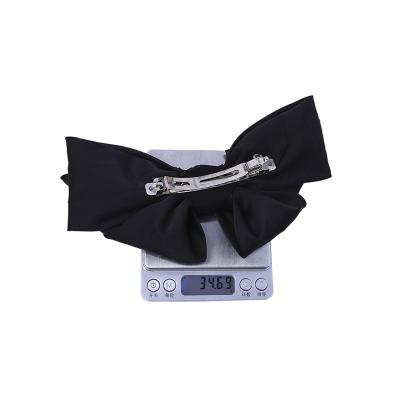 China Wholesale Fashion Popular Girls Gift Smooth Satin Hair Accessories Large Bow Hair Clips for sale