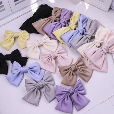 China Fashion New Arrive Korean Hair Clips For Girls Smooth Satin Candy Color Bowknot Hair Clips for sale