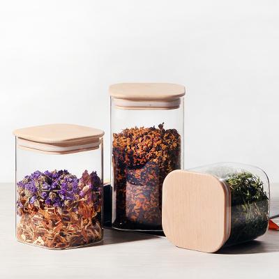 China Sustainable Glass Jar With Bamboo Lid Sealed Canister Food Storage Bottles Container Kitchen Storage For Loose Coffee Bean Sugar Salt Tea for sale