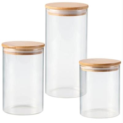 China Sustainable Food Container Bamboo Lid High Borosilicate Food Sealed Jar Kitchen Glass Grain Sealed Fresh-Keep Canned Storage Jar for sale