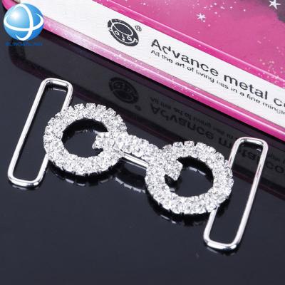 China nickel free jewelry rhinestone bikini buckle/bikini glass connector for swimsuit decorations for sale