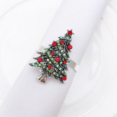 China Sustainable Reusable Gold Christmas Tree Napkin Ring For Gift Wedding Holiday Party for sale