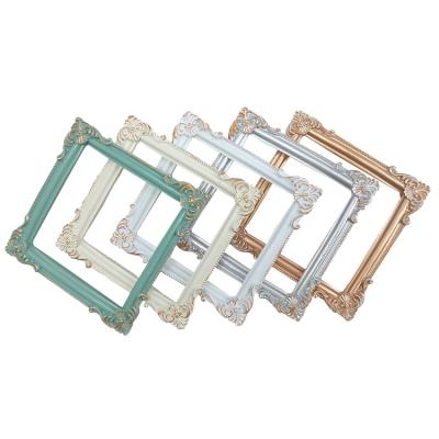 China European Style SOLID COLOR ZC Resin Wall Frames Gold Mini Retro Relief Photo Frame Works Creative Display INS Pose Photo Props Resin Frame for sale