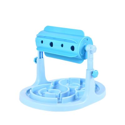 China Automatic Dog Feeder Bowl Dog Toys ABS Silicone Slow Feeder Snacker Interactive Pet Toy for sale