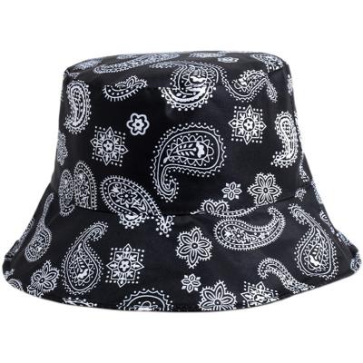 China Sunscreen style retro double-sided sunshade hat double-sided cashew flower pond hat adult national printed fisherman's hat for sale