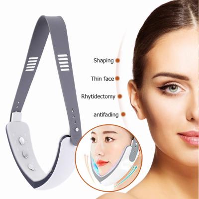 China 2021Vibration face lift massage slimming infrared led face lift belt lights V shaping face lift beauty light facial instrument for sale