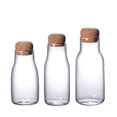 China 200ML 300ML 700ML Reusable Clear High Borosilicate Glass Bottle For Milk With Cork for sale