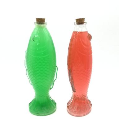 China Drinking Packaging 250ML Attractive Fish Shaped Carve Glass Milkshak Bottle With Metal Screw Cap for sale